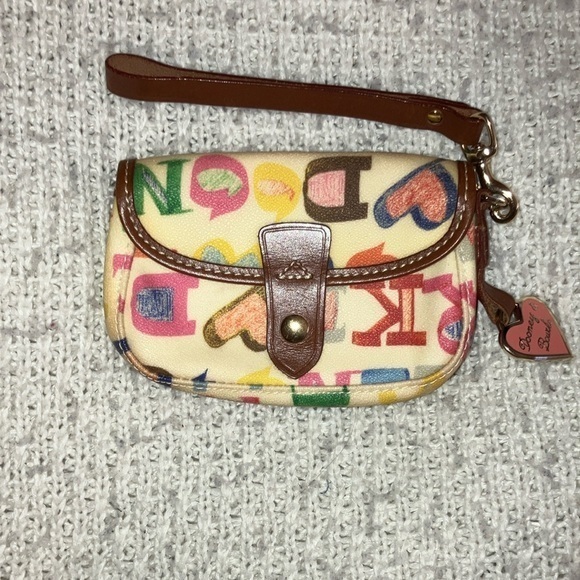 Dooney & Bourke Handbags - Dooney & Bourke Hearts and Stars Patterned Wristlet